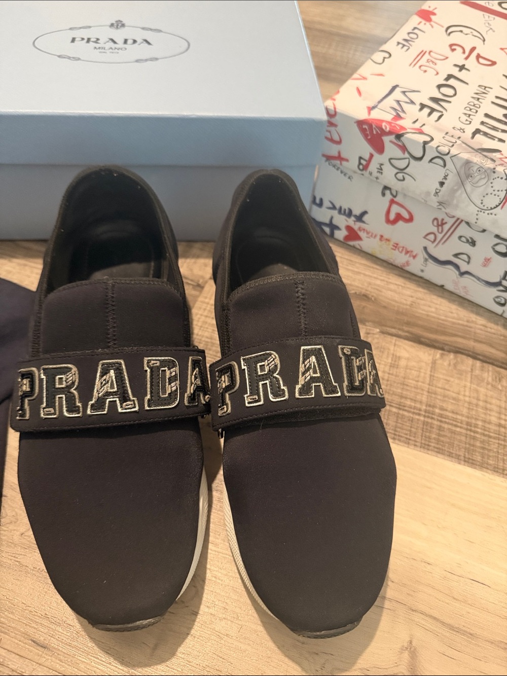 Authentic Prada Black Slip-On Sneakers with Logo Strap